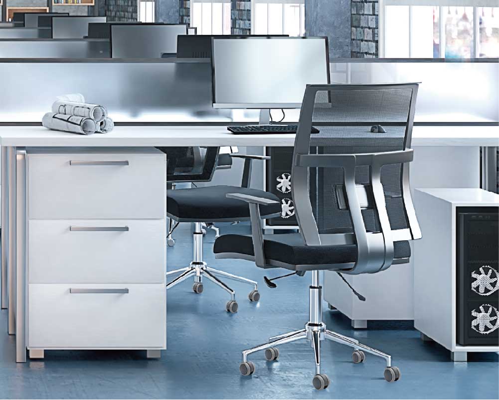 Modern office setup  chair on caster wheels in front of a wooden desk with a computer and office supplies.