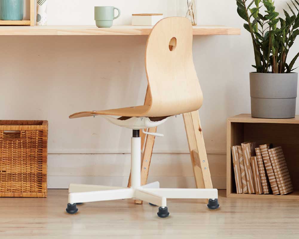 Office chair with Bell Glides for improved stability on wooden floors.
