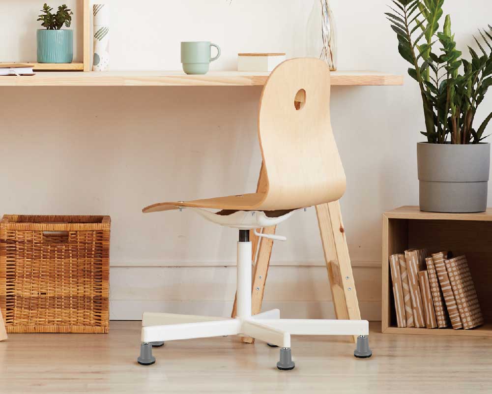 Office chair with Bell Glides for improved stability on wooden floors.